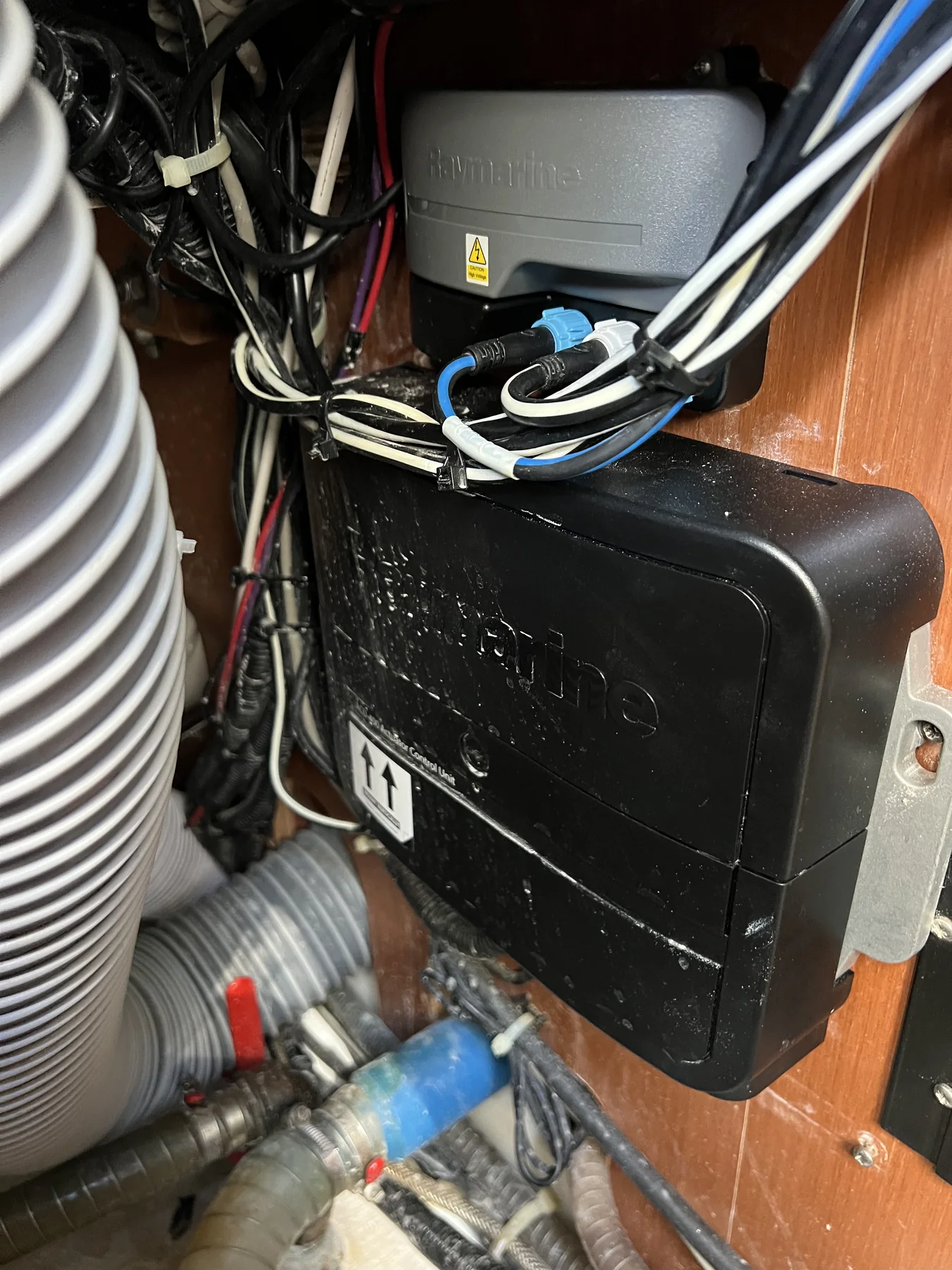 Labeled marine autopilot and navigation network panel with organized wiring.